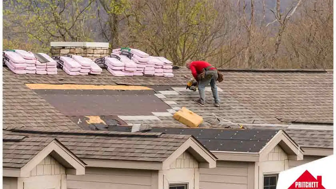 overhead view of corned beef sliced and on a platter with cabbage, potatoes, and carrots