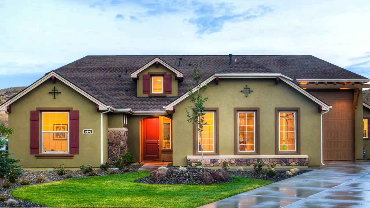 overhead view of corned beef sliced and on a platter with cabbage, potatoes, and carrots