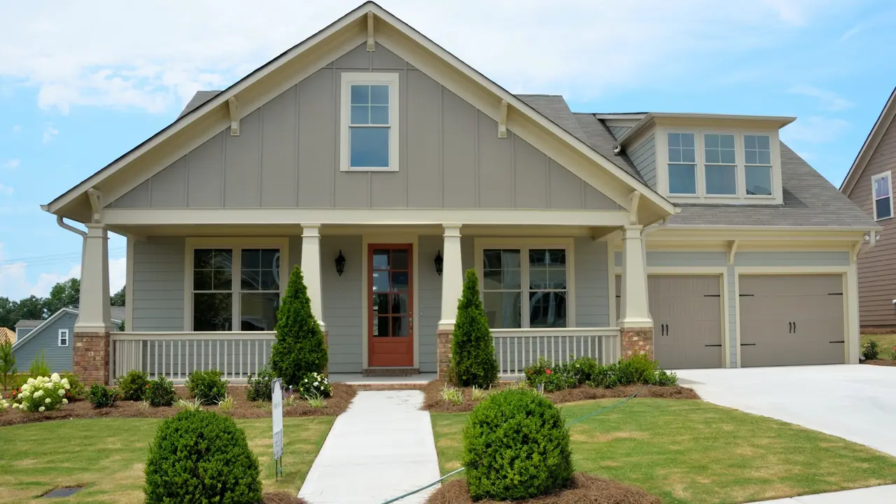 overhead view of corned beef sliced and on a platter with cabbage, potatoes, and carrots