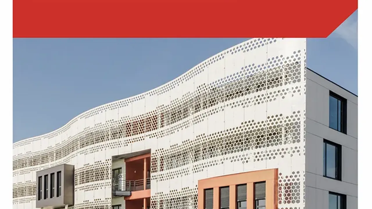 Close up on a plate of mashed potatoes, topped with baked pork chops with cream of mushroom soup, and a side of green beans.