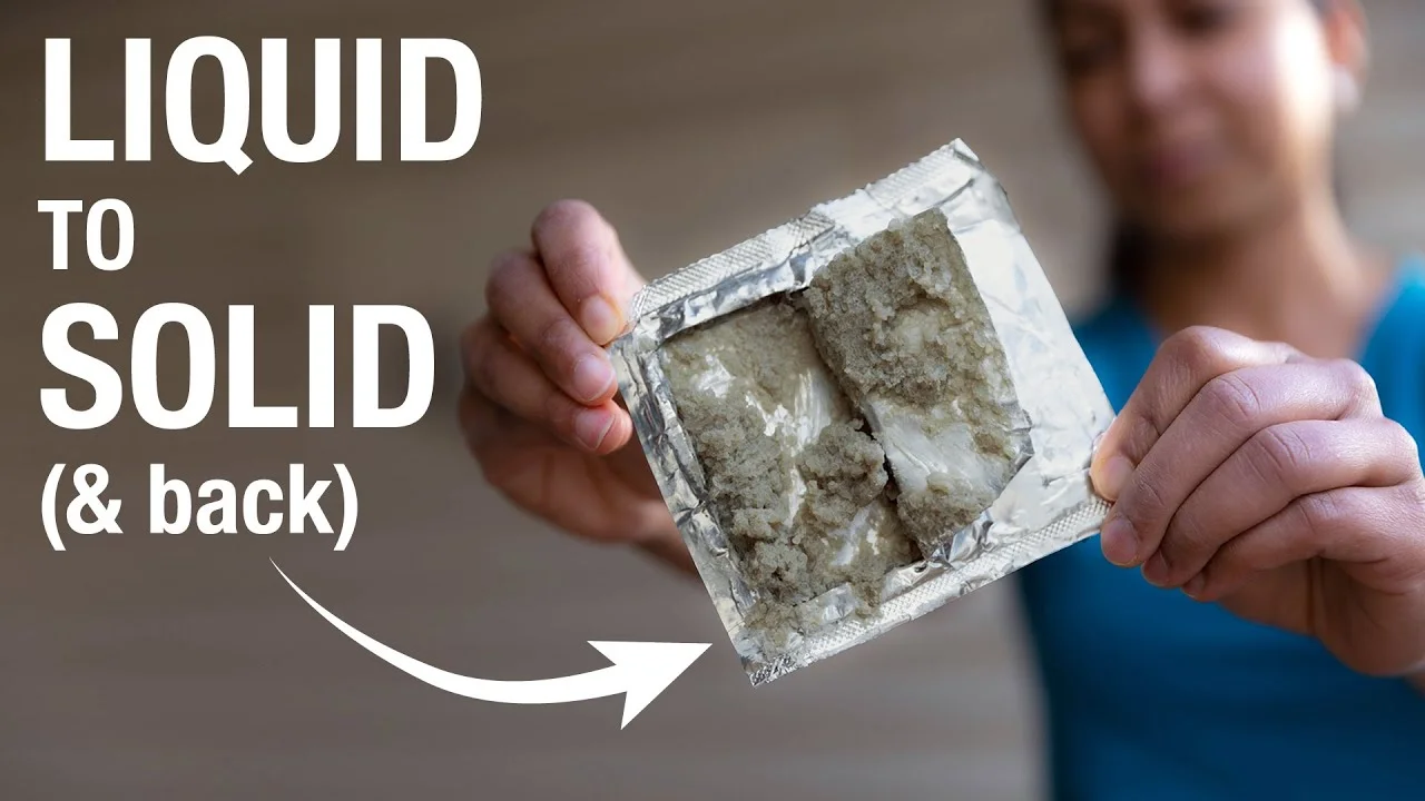 Close up on a plate of mashed potatoes, topped with baked pork chops with cream of mushroom soup, and a side of green beans.