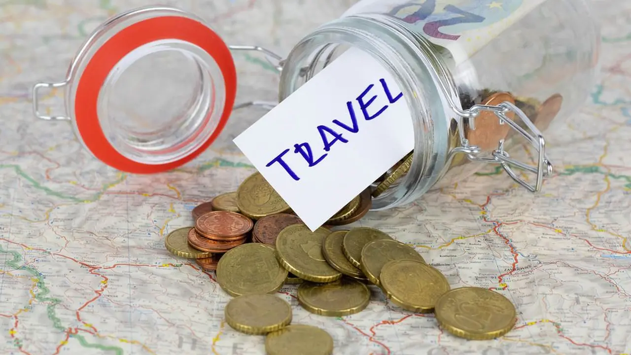 overhead view of corned beef sliced and on a platter with cabbage, potatoes, and carrots