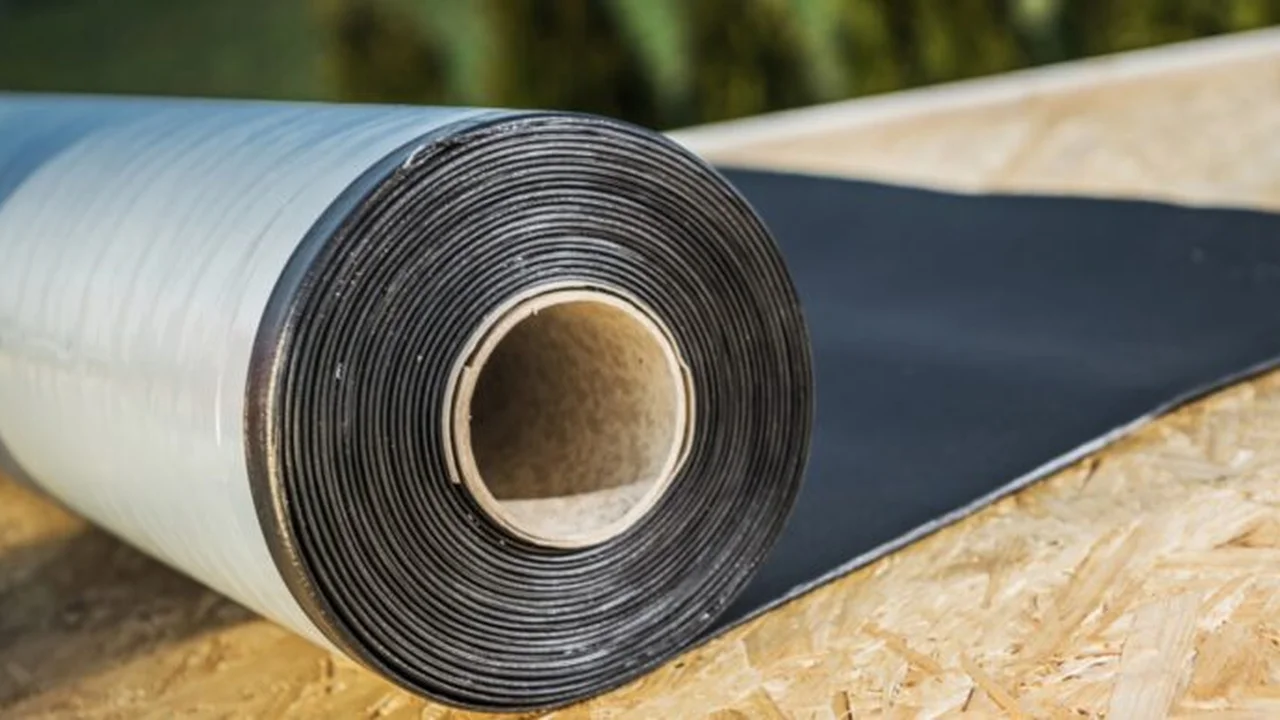 Close up on a plate of mashed potatoes, topped with baked pork chops with cream of mushroom soup, and a side of green beans.